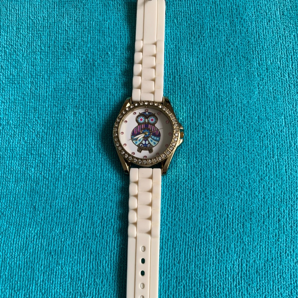 New white watch with gorgeous owl surrounded by pink and white Cubic zirconia.